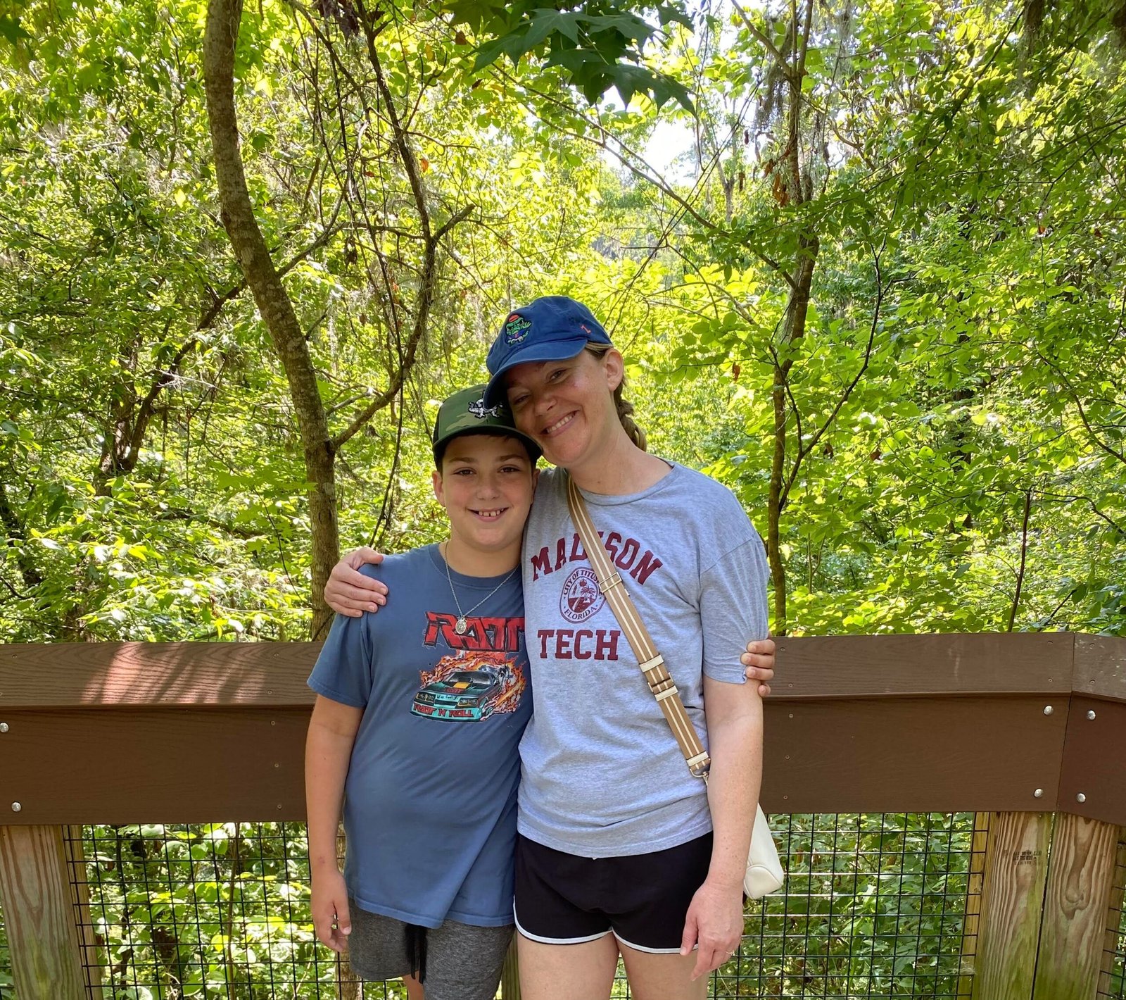 Mom and son posing for photo